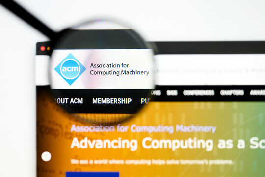 Milan, Italy 2026, 5 Jul Closeup of acm website page on a laptop screen. Focus on acm logo under a magnifying glass.