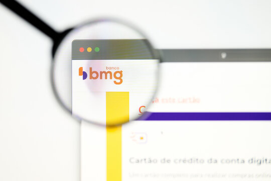 Milan, Italy 2026, 5 Jul Closeup of Banco BMG website page on a laptop screen. Focus on Banco BMG logo under a magnifying glass.