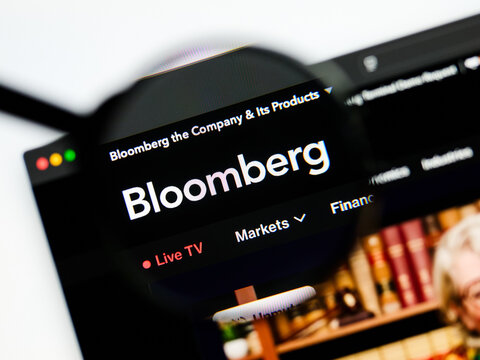 Milan, Italy 2026, 5 Jul Closeup of Bloomberg website page on a laptop screen. Focus on Bloomberg logo under a magnifying glass.