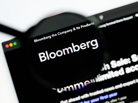 Milan, Italy 2026, 5 Jul Closeup of Bloomberg website page on a laptop screen. Focus on Bloomberg logo under a magnifying glass.