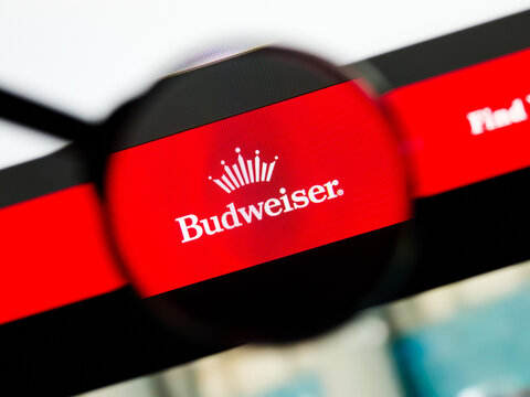 Milan, Italy 2026, 5 Jul Closeup of Budweiser website page on a laptop screen. Focus on Budweiser logo under a magnifying glass.