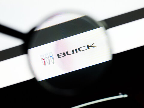 Milan, Italy 2026, 5 Jul Closeup of Buick website page on a laptop screen. Focus on Buick logo under a magnifying glass.