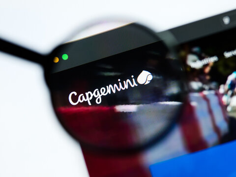 Milan, Italy 2026, 5 Jul Closeup of Capgemini website page on a laptop screen. Focus on Capgemini logo under a magnifying glass.