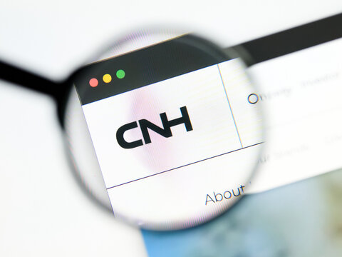 Milan, Italy 2026, 5 Jul Closeup of CNH Industrial website page on a laptop screen. Focus on CNH Industrial logo under a magnifying glass.