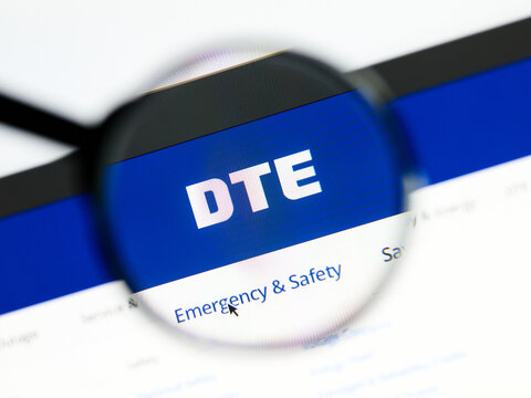 Milan, Italy 2026, 5 Jul Closeup of DTE Energy website page on a laptop screen. Focus on DTE Energy logo under a magnifying glass.