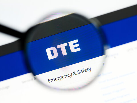 Milan, Italy 2026, 5 Jul Closeup of DTE Energy website page on a laptop screen. Focus on DTE Energy logo under a magnifying glass.