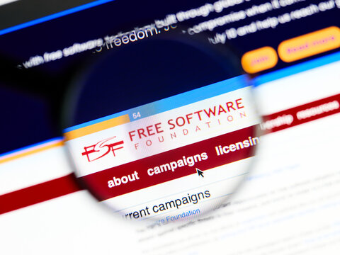 Milan, Italy 2026, 5 Jul Closeup of Free software foundation website page on a laptop screen. Focus on Free software foundation logo under a magnifying glass.
