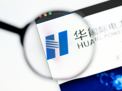 Milan, Italy 2026, 5 Jul Closeup of Huaneng Power International website page on a laptop screen. Focus on Huaneng Power International logo under a magnifying glass.