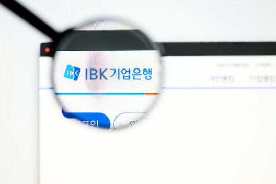 Milan, Italy 2026, 5 Jul Closeup of Industrial Bank of Korea IBK website page on a laptop screen. Focus on Industrial Bank of Korea IBK logo under a magnifying glass.
