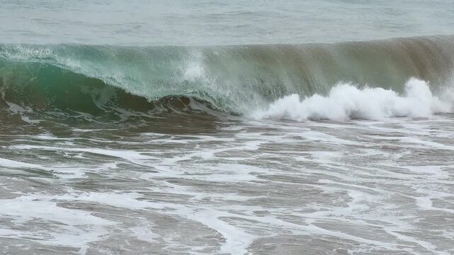 Front on view of ocean waves building and breaking in Port Elliot South Australia in 4k video footage