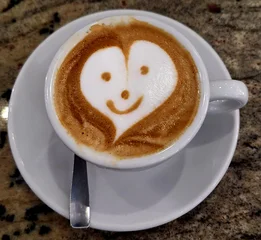 Cappuccino with foam and smiling face © alessandro0770