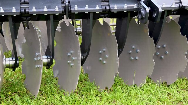 Disc harrow agriculture machinery with soil tillage metal equipment attachment featuring multiple serrated disc rows