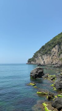 Waves Crashing Over Mossy Rocks on the Black Sea Coast at Inkumu Beach, Bartin, Turkey