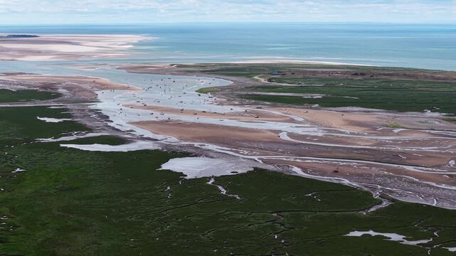 Drone shot of Blakeney National Nature Reserve coastal landscape, UK