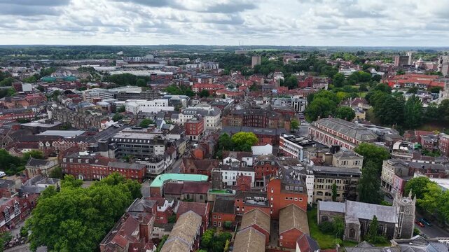 Aerial view of buildings and streets in Norwich city center, UK