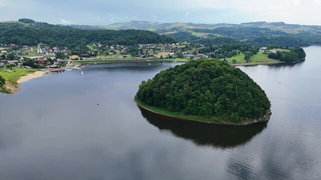 Drone shot of Monkey Island and Grodek nad Dunajcem at Roznow lake, Poland
