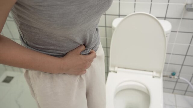 Constipation and diarrhea in bathroom. Hurt woman touch belly  stomach ache painful. colon inflammation problem, toxic food, abdominal pain, abdomen, constipated in toilet, stomachache, Hygiene