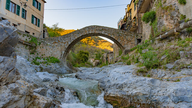It is a Romanesque stone bridge that crosses the Neva River in the ancient medieval village of Zuccarello, in the province of Savona, Liguria, Italy. Most beautiful villages in Italy
