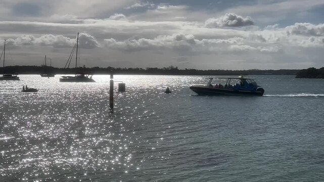 Passenger boat and water bike on the Hastings River in Port Macquarie