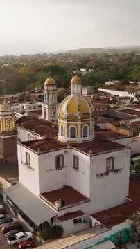 Aerial View Of San Miguel Archangel Holy Spirit Parish Church In Comala, Mexico - Drone, Vertical Shot