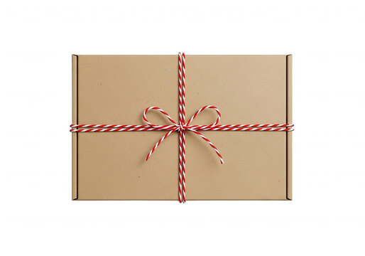 Small cardboard shipping box tied with red and white festive baker twine isolated on transparent background