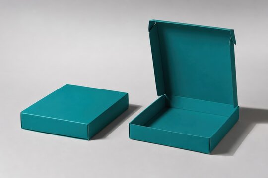 Two small teal square cardboard boxes one open and one closed with cardboard container packaging template