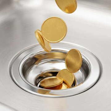 Money Down the Drain Concept, Blank Gold Coins Falling Into a Stainless Steel Sink Drain