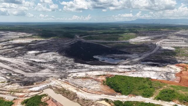Aerial view of coal mining, land full of excavation holes