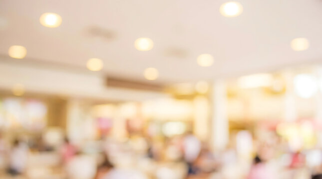 Bright ceiling lights in blurred background