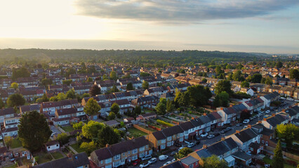 Fototapeta premium Aerial View of Luton City Streets and Homes During Sunset of England UK. June 14th, 2022. Drone Camera Footage