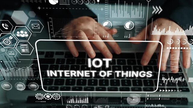 Hands Typing on Keyboard Surrounded by Data Graphics Representing Internet of Things Technology and Connectivity. Asymptotic smart data analytic.