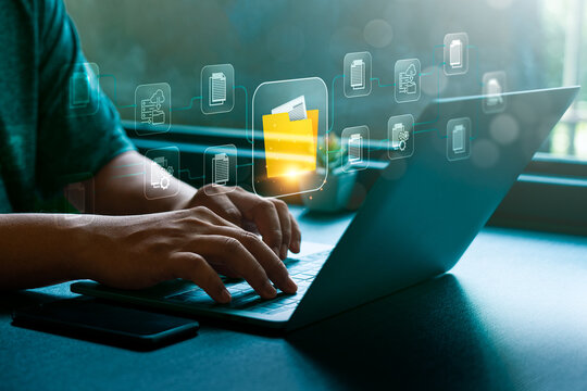 Digital document management concept with person using laptop showing virtual folder interface connected document workflow cloud storage file processing and business data organization
