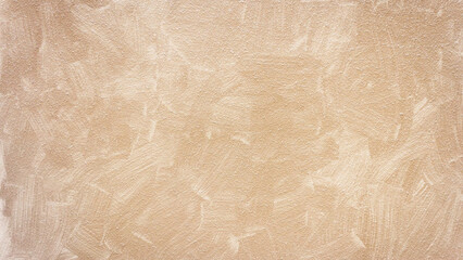 Obraz premium Light brown stucco plaster wall texture, subtle brush strokes, abstract grunge background, natural rough surface.