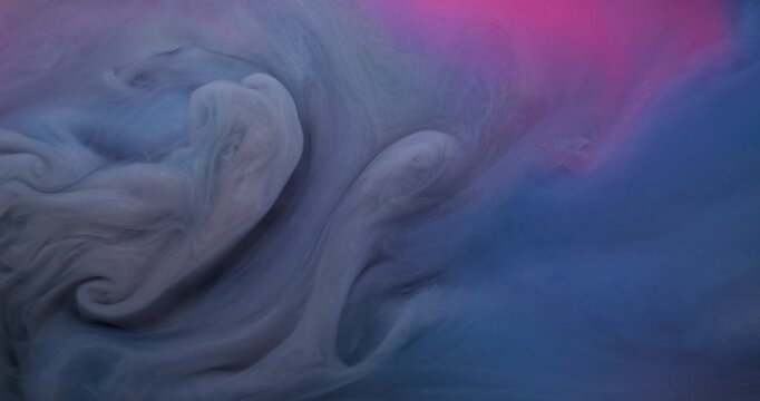 Art cloud. Pigment blend. Gray blue pink fume paint swirl in colorful liquid. Shimmering defocused curl stream texture abstract background.