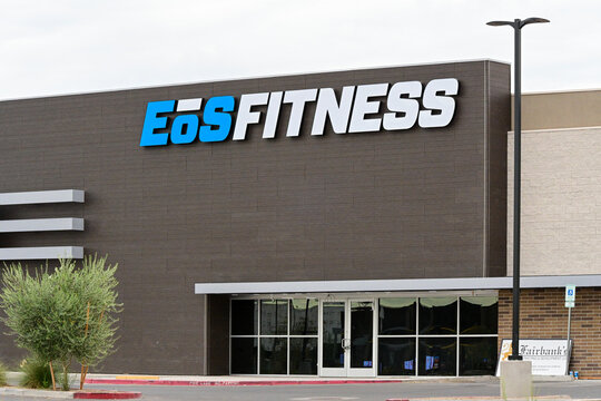Recently completed EōS Fitness gym building with branded signage and modern storefront, illustrating fitness industry expansion, commercial development, and new retail construction