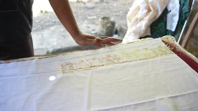 Traditional Batik Fabric Printing by Indonesian Artisan