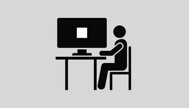 Minimalist black icon of a professional person sitting on a chair at a desk working on a desktop computer on a light grey background.