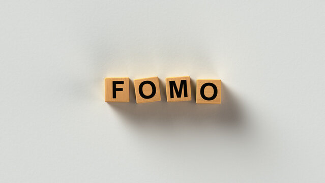 FOMO Fear of Missing Out Acronym on Wooden Letter Blocks 3D render