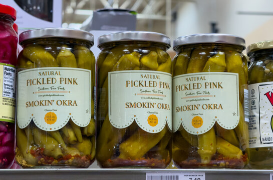 Pickled Pink Smokin&rsquo; Okra Jars Displayed On Store Shelf