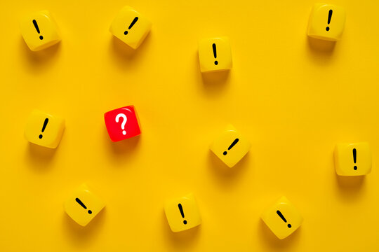 single red question mark among many exclamation marks. isolated on yellow background. concept of problem solving