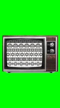 Vintage TV on green screen with abstract animation, perfect for chroma key edits and retro video projects.