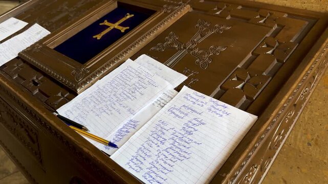 solemn church interior sanctuary confession prayer congregation repentance forgiveness and scripture manuscript bible parchment wooden desk priest clergy devotion faith silence dim stone architecture