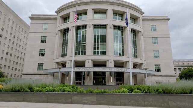 Exterior of Pennsylvania Judicial Center in Harrisburg, Pennsylvania with drone moving in.