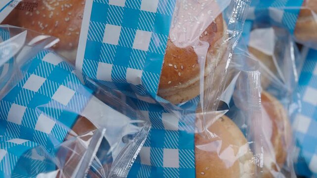 Burgers wrapped and ready at a food market in spring