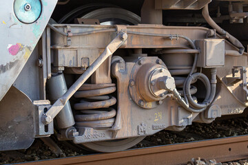 Fototapeta premium Railway Bogie Wheel and Suspension Assembly, Train Engineering, Mechanical Detail, Steel Axle, Rail Transport