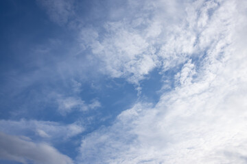 Fototapeta premium Blue sky white cloud cloudscape sunlight weather nature atmosphere background with soft cirrus pattern and bright morning light calm airy mood ample copy space