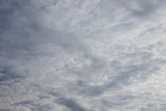Cloud sky overcast gray weather atmosphere nature cloudscape, soft layered cloud cover creating calm moody background with diffuse light, outdoor aerial texture for minimal design