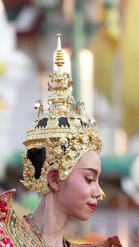 Traditional Thai Dancer in Ornate Gold Chada Headdress and Costume