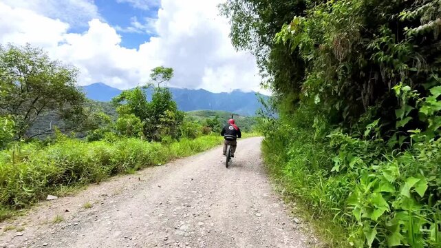 Cyclist Riding Down the Famous Death Road in Bolivia