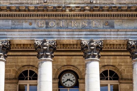Paris, France - June 17, 2026: Close-up on the "Bourse" (Stock exchange) inscription in golden letters on the Palais Brongniart, formerly Palais de la Bourse, built in 1826.